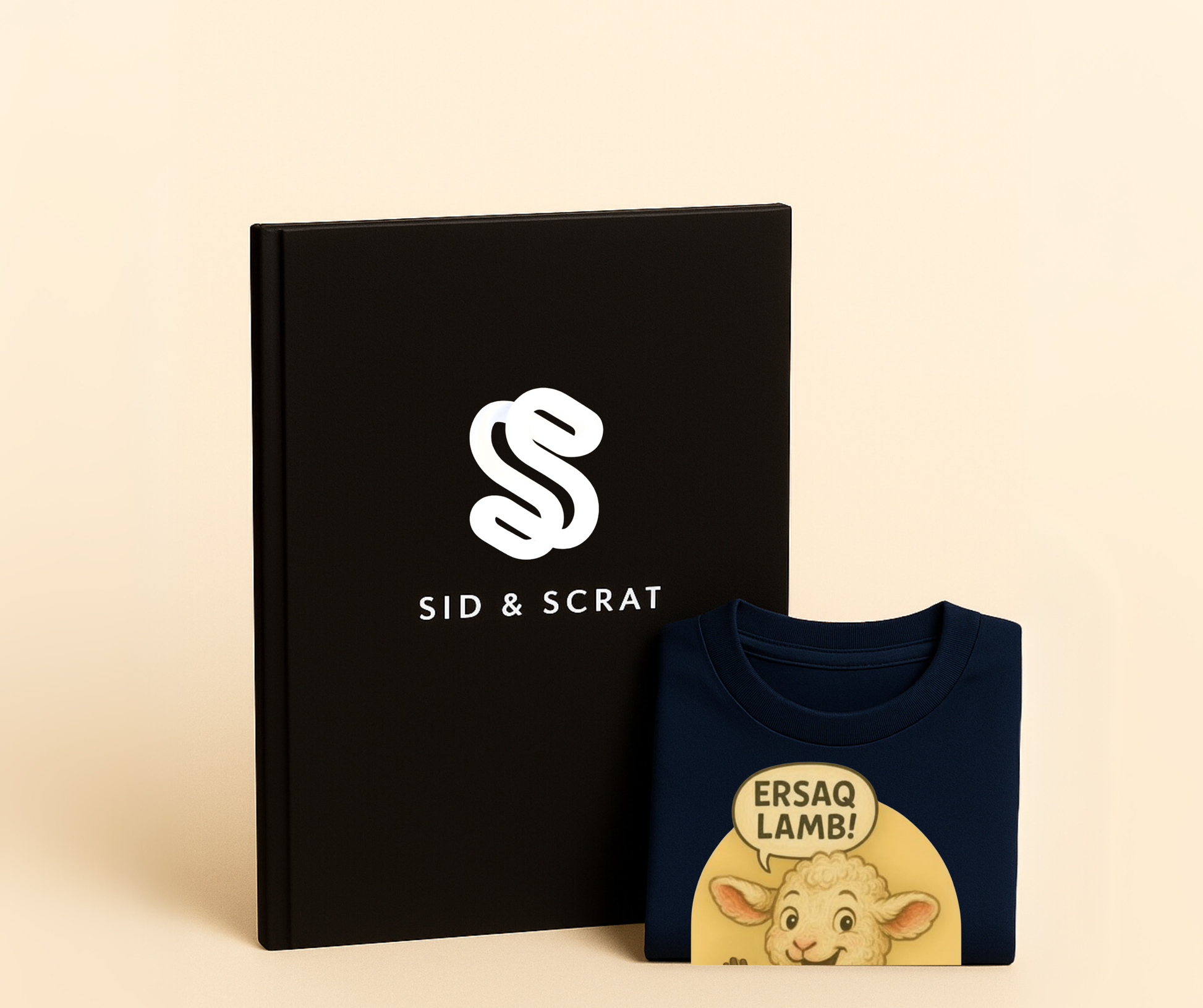 Navy blue Mur Lamb t-shirt folded next to Sid & Scrat branded book